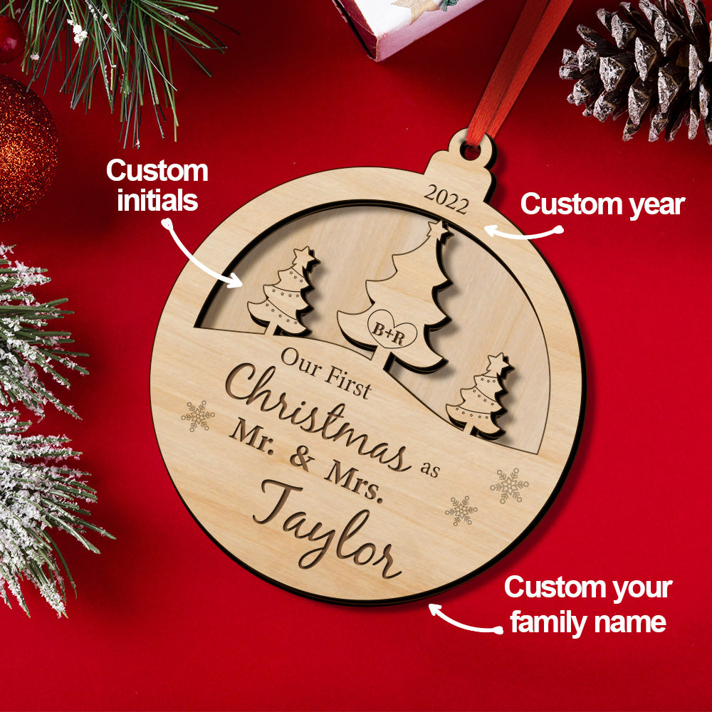 Personalized wooden Christmas ornament for newlyweds, features custom names and date, showcasing a family's first Christmas.