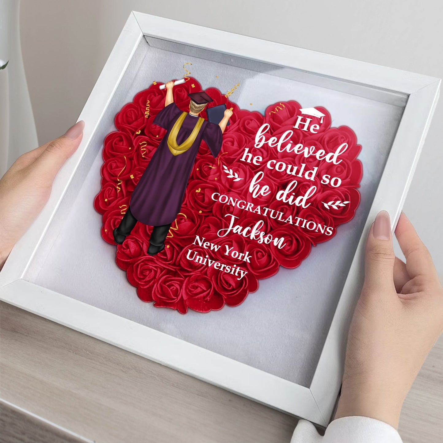 Personalized graduation gift flower shadow box with red heart flower arrangement, "She believed she could"